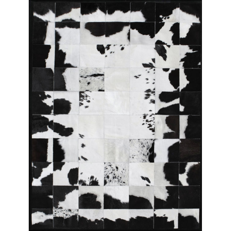 Art Hide Cowhide Abstract Area Rug in Black/White Perigold